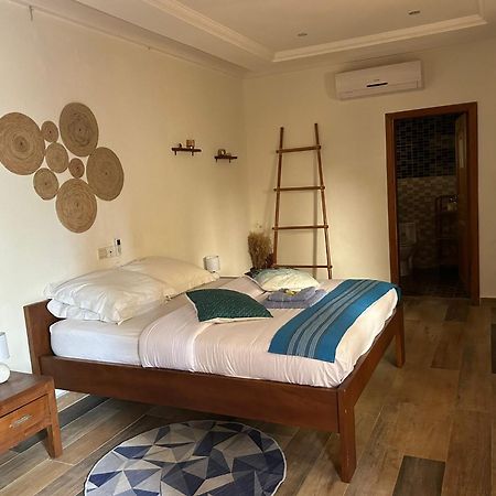 L'Oasis Guesthouse โกโตนู ภายนอก รูปภาพ