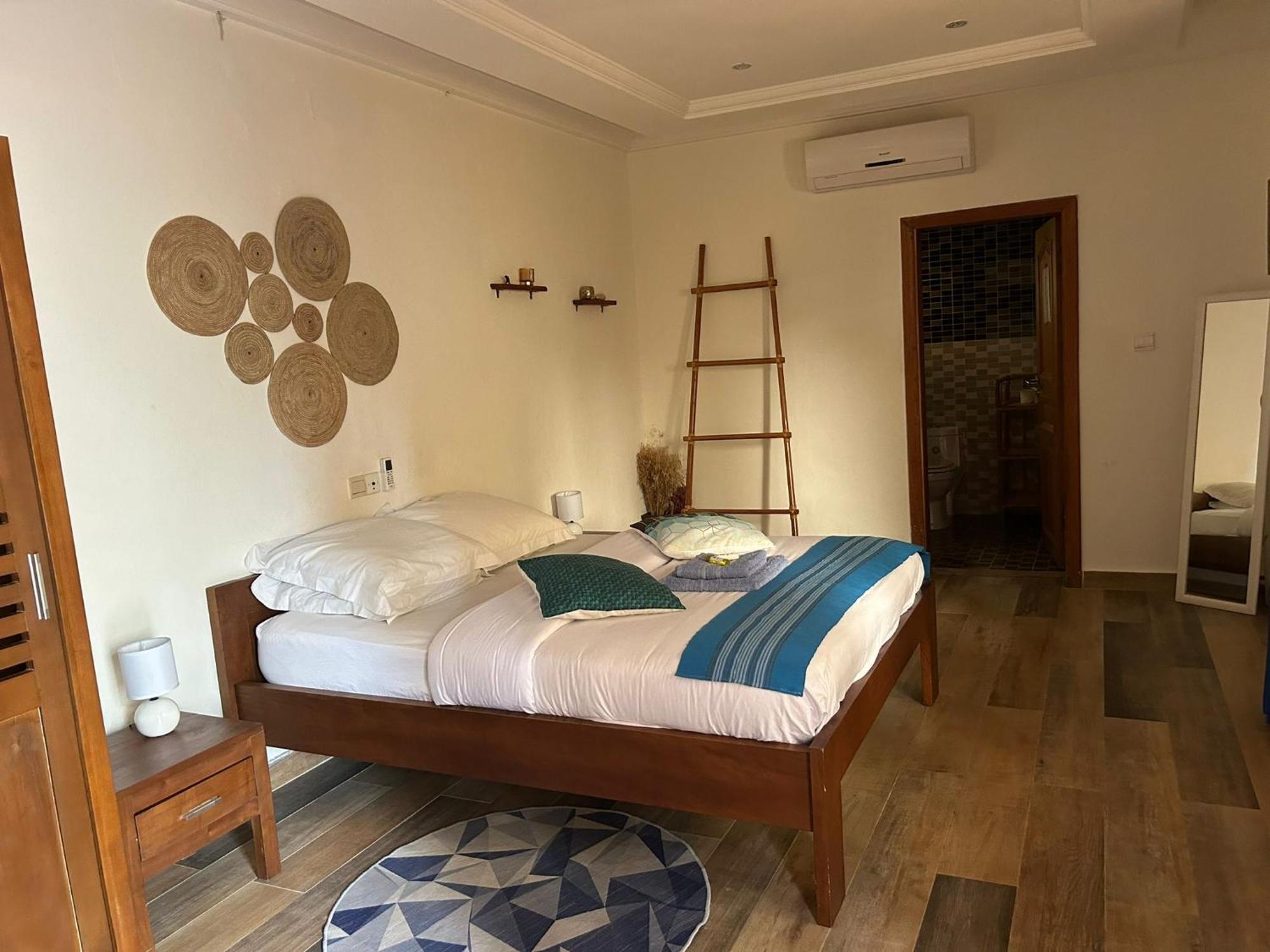 L'Oasis Guesthouse โกโตนู ภายนอก รูปภาพ
