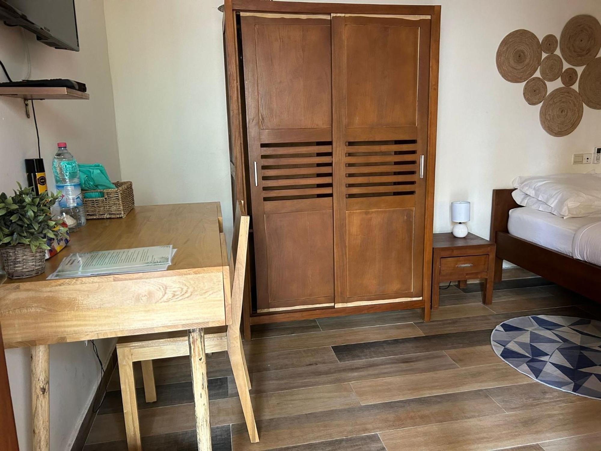 L'Oasis Guesthouse โกโตนู ภายนอก รูปภาพ