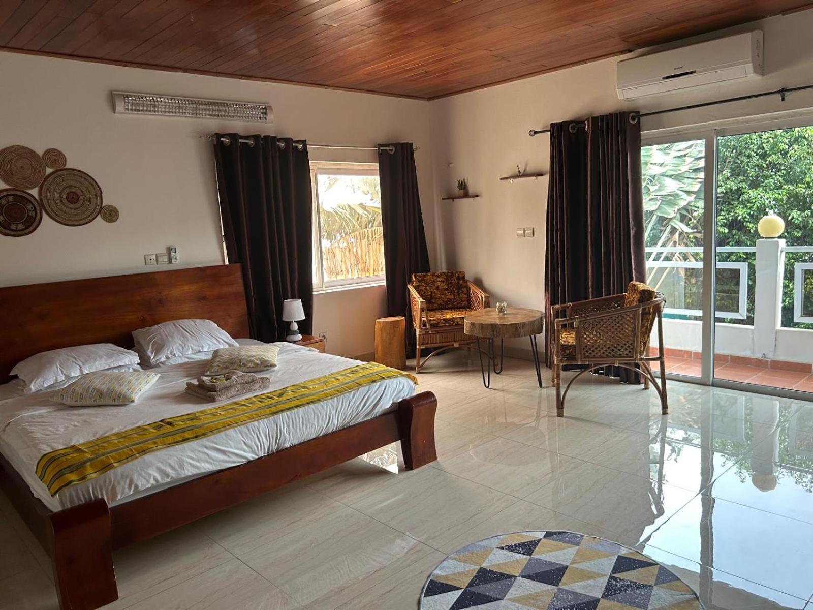 L'Oasis Guesthouse โกโตนู ภายนอก รูปภาพ