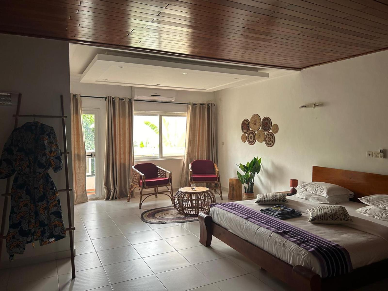 L'Oasis Guesthouse โกโตนู ภายนอก รูปภาพ