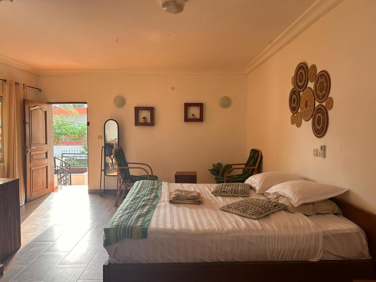 L'Oasis Guesthouse โกโตนู ภายนอก รูปภาพ