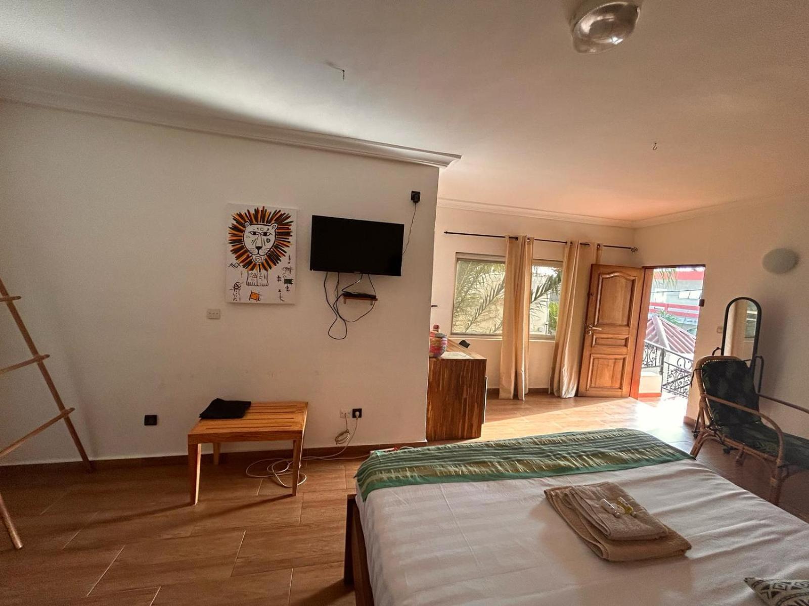L'Oasis Guesthouse โกโตนู ภายนอก รูปภาพ